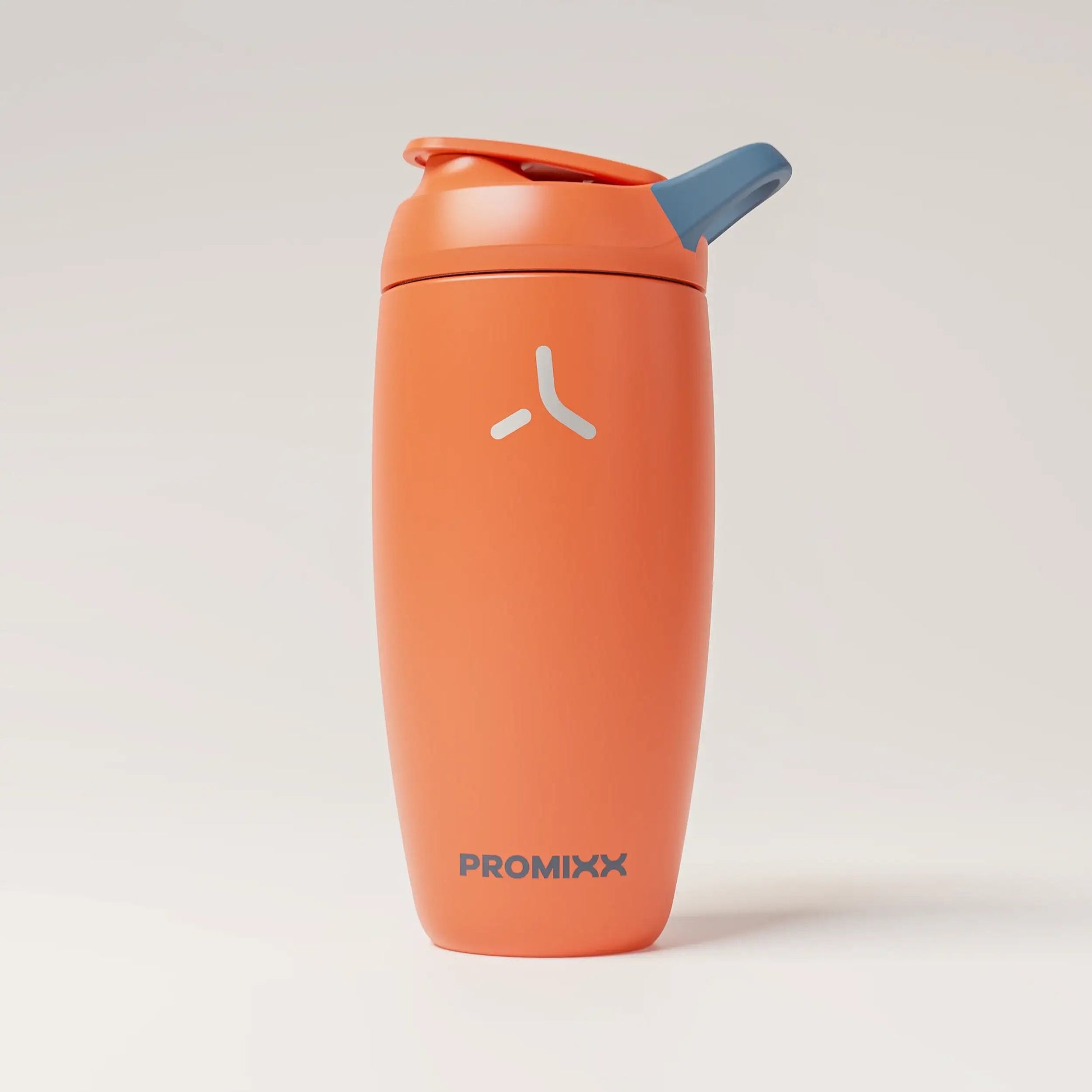 insulated-performance-shaker-bottle-t6 SHKR_18550_dwSS-S1.1_burntOrange_midnightBlue_1_1_hero_edit_98573fa4-4557-4dbd-9f16-b284eece3df3.png